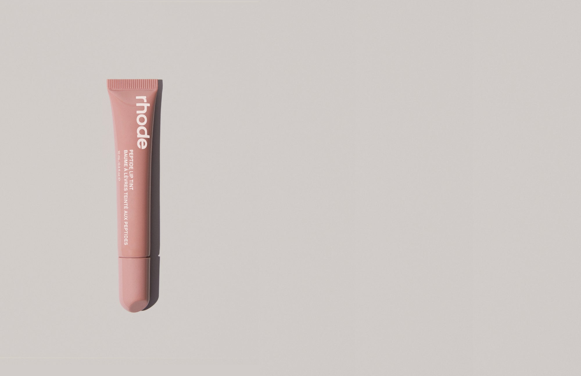 Rhodes peptide lip tint toast